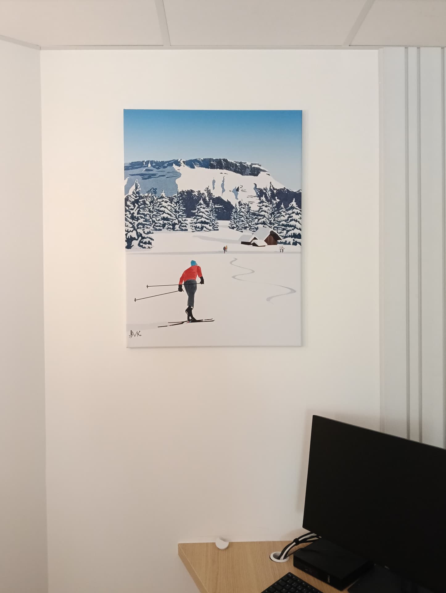 Fixation d'une toile décorative skieur de fond dans un bureau — locaux professionnels à Chambéry